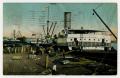 Thumbnail image of item number 1 in: '[Postcard of Steamship Loading Cotton in New Orleans]'.
