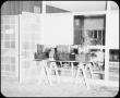 Photograph: [Six Boxes on Table]