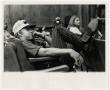 Photograph: [Photograph of Student in the Auditorium]