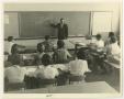 Primary view of [Photograph of McMurry University Professor Lecturing to Students]