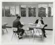 Photograph: [Photograph of Studying at a Table in the Jay-Rollins Library]