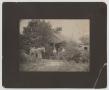 Photograph: [Photograph of Family in Front of Home]