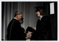 Photograph: [Photograph of Dr. Kim Presenting a Diploma]