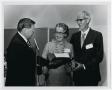 Photograph: [Photograph of Dr. Thomas Kim and the Tuckers]