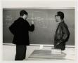 Photograph: [Photograph of Two Students in a Classroom]