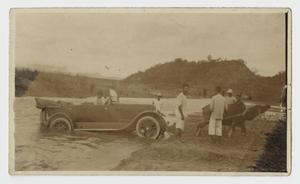Primary view of object titled '[Photograph of a Car in a River]'.