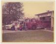Photograph: [Men in Front of Fire Truck]