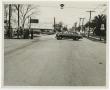 Photograph: [Photograph of Fire Chief's Car in Street]