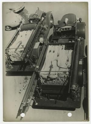 Primary view of object titled '[Aerial View of Hose Trucks]'.
