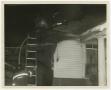Photograph: [Firemen on the Roof of a House]