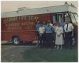 Photograph: [Group in Front of HazMat Truck]