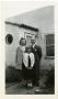 Primary view of [Photograph of Family in Front of House]