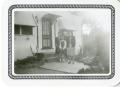 Photograph: [Group of Women in Front of House]