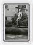 Photograph: [Photograph of J.P. Sewell in Front of Buildings]