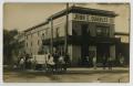 Thumbnail image of item number 1 in: '[Postcard of John E. Quarles Co. Lumber Building]'.
