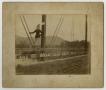 Primary view of [Photograph of a Woman on a Bridge]