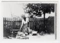 Thumbnail image of item number 1 in: '[African American Woman Tending Fire]'.