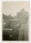 Photograph: [Photograph of Lester Johnson and Half-track]