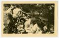 Thumbnail image of item number 1 in: '[Postcard of Group at Bus Stop]'.