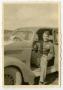 Photograph: [Photograph of Lester Johnson in Car]