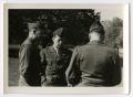Photograph: [Photograph of Officers Talking]