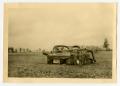 Photograph: [Photograph of Overturned Tank]