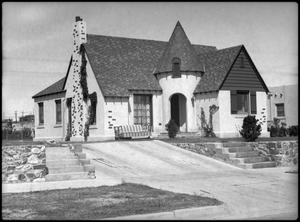 Primary view of object titled '[Stucco House with Tower]'.