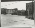 Photograph: [Businesses on the Side of a Street]