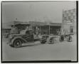 Primary view of [Truck Parked by Auto Parts Shops]
