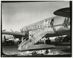 Primary view of object titled '[Couple Together on an Aircraft Boarding Stair]'.