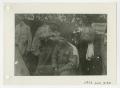 Photograph: [Photograph of Soldier Giving Haircut]