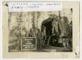 Photograph: [Group of Soldiers Outside a Supply Truck With a Sign]