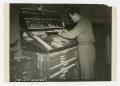 Thumbnail image of item number 1 in: '[Photograph of Soldier Working Printing Press]'.