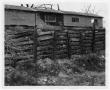 Photograph: [Wooden Fence and Brick Building at Moore Park]