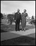 Photograph: [Man and Woman Standing Outside]