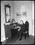 Photograph: [Governor W. Lee O'Daniel Seated at Desk]