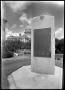 Photograph: [Monument and Texas State Capitol Building]