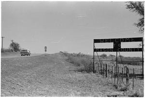 Primary view of object titled '[Roadsign for Mason County, Texas]'.