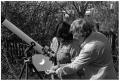 Photograph: [Two People Viewing Images of a Solar Eclipse]