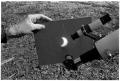 Photograph: [Projecting a Solar Eclipse Through a Telescope]