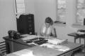 Photograph: [Woman at Desk in First United Methodist Church[