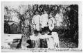 Photograph: Daniel, Nevil, and Carl on a cottonwood stump