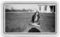Primary view of [Dorothy Katt Sitting on Lawn]