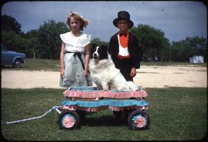 Primary view of object titled '[Two Students With Dog]'.