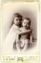 Photograph: [Portrait of a Toddler and an Infant]