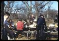 Photograph: [People at an Outdoor Picnic Table]