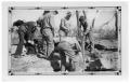 Photograph: [Men Working on a Rocky Outcropping]