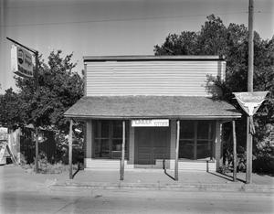 Primary view of object titled '[Pioneer Store, (East facade)]'.