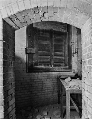 Primary view of object titled '[Foundry Building (Continental Gin Complex), (Room 104 - East wall with North and South views, low angle - table on North wall, guillotine window)]'.