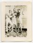 Photograph: [Three Soldiers Goofing Around in Camp]